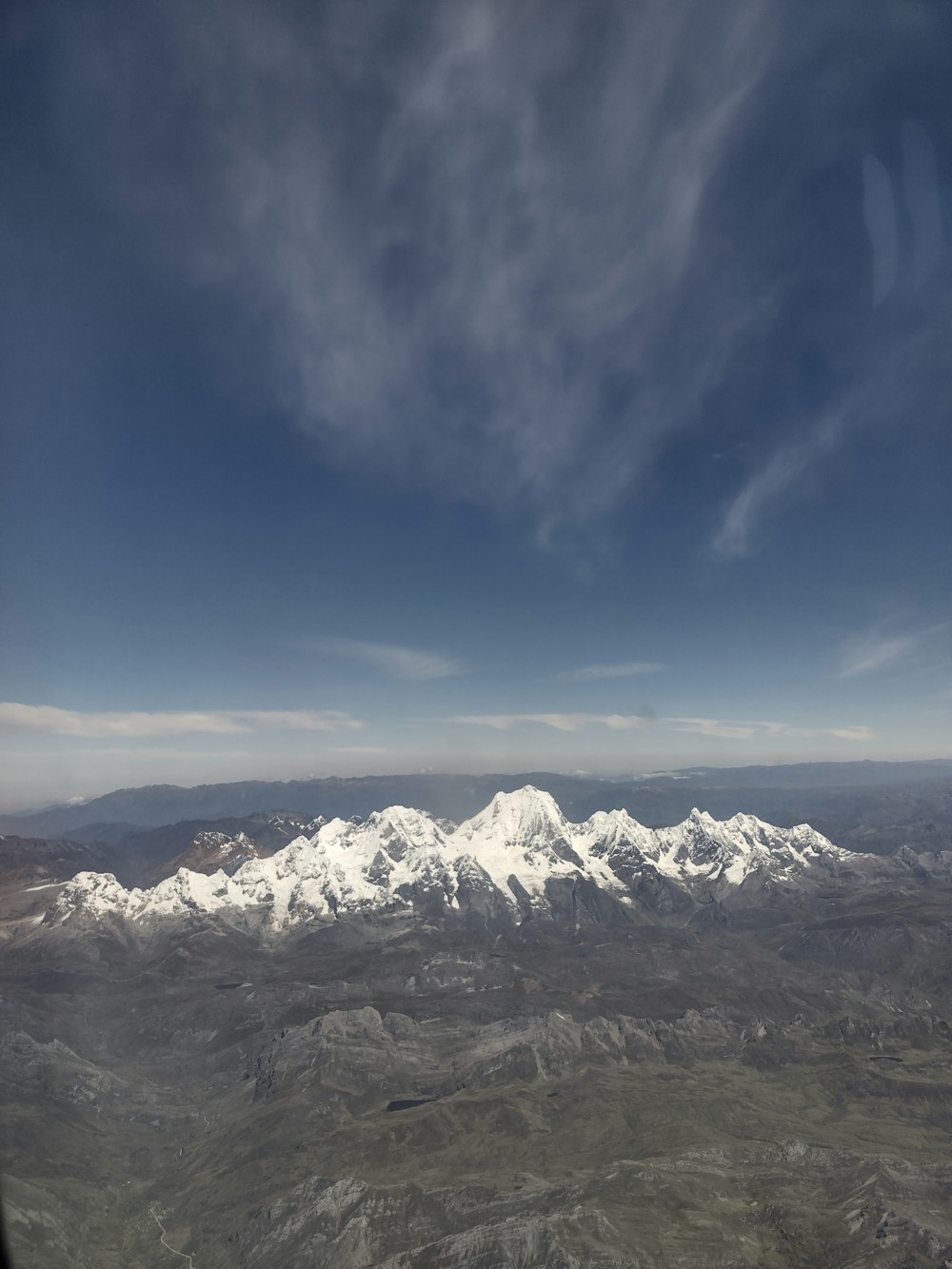 a view of a mountain range from an airplane