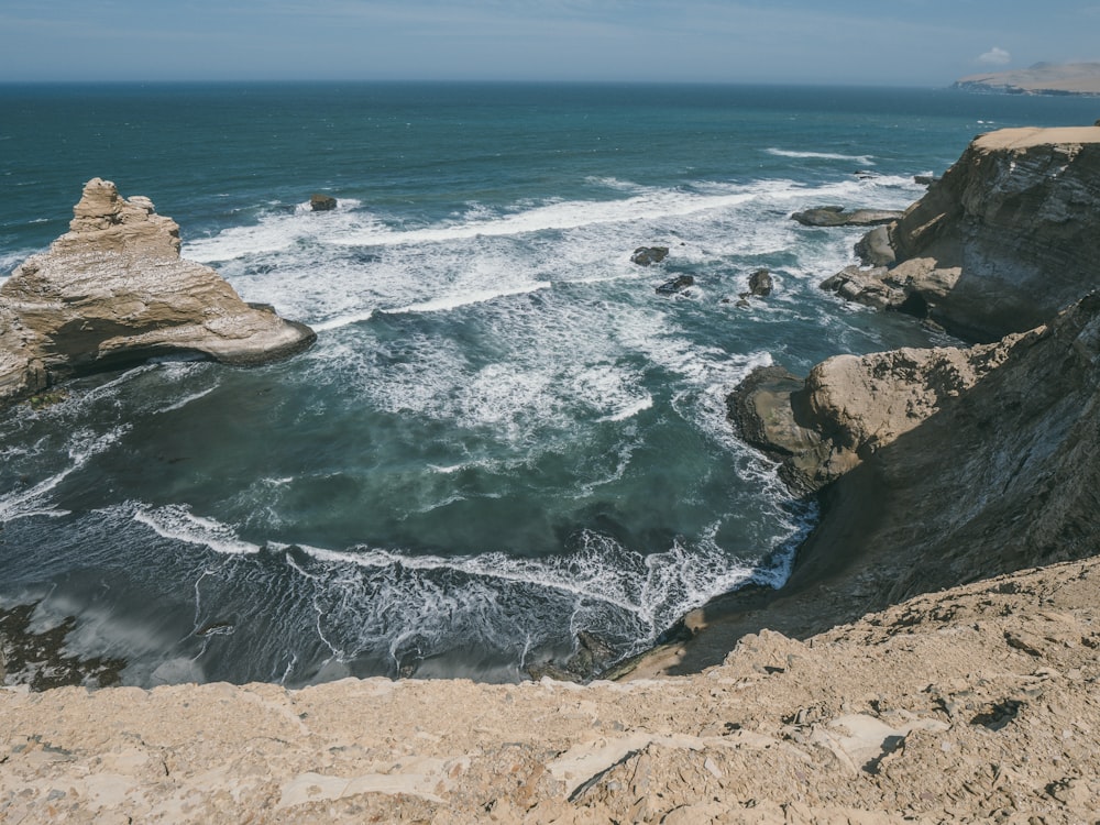 a view of the ocean from a cliff