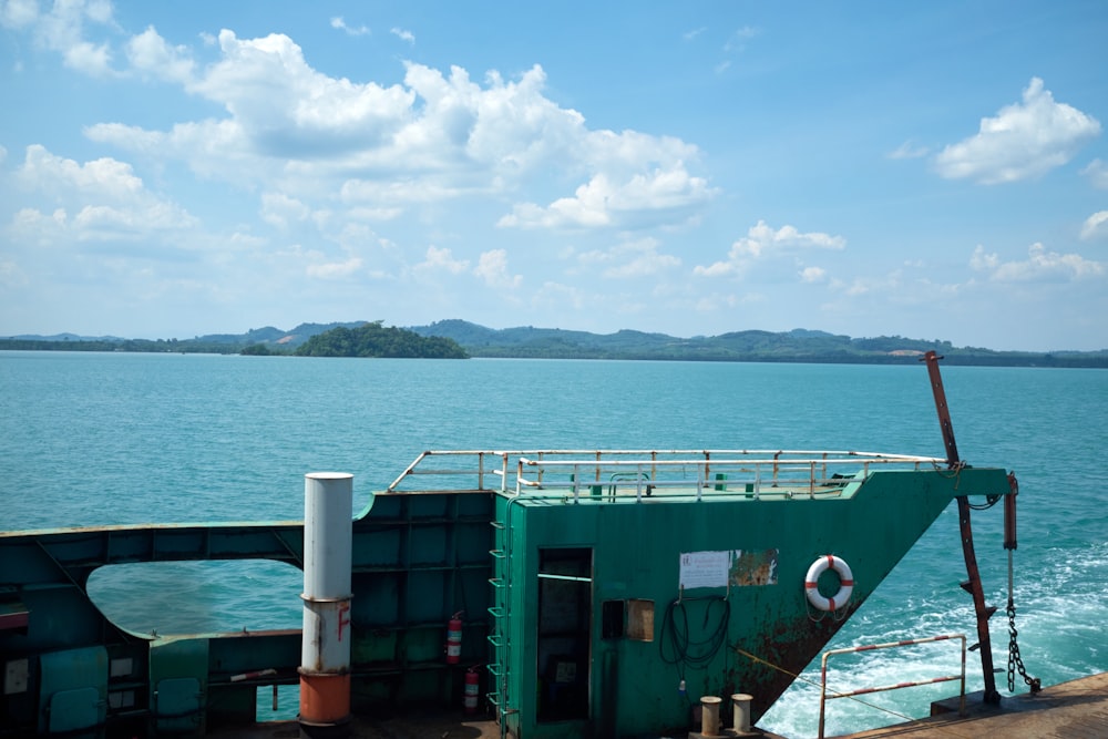 a boat traveling across a large body of water