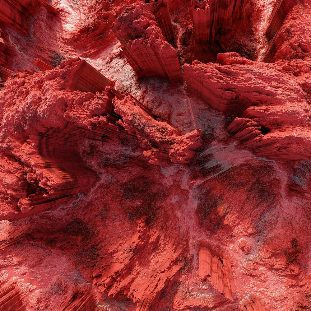 an aerial view of a red rock formation