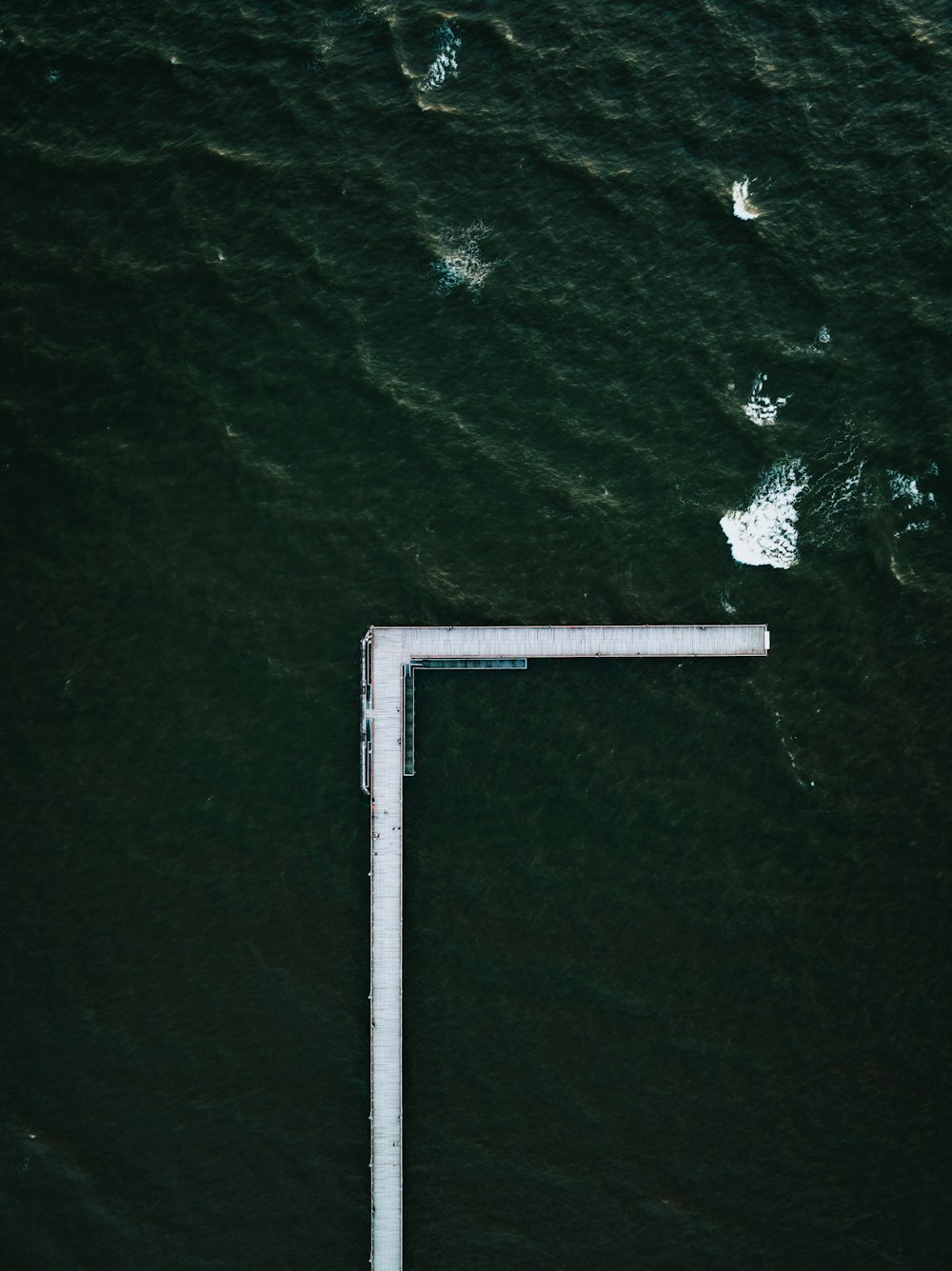 an aerial view of a street sign in the water