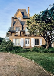 Charming traditional stone house nestled in a peaceful village setting.