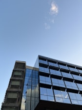 a very tall building next to a very tall building