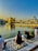 A serene image of a spiritual gathering at Triveni Sangam.