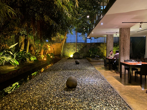 A tranquil spa setting with soft lighting and natural elements.
