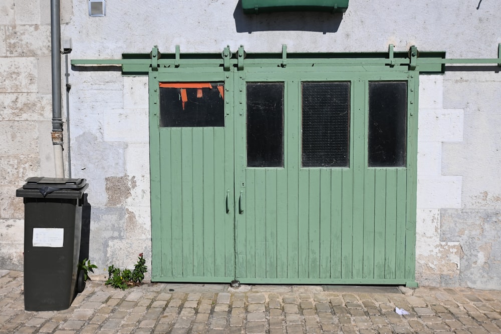 a couple of doors that are on a building