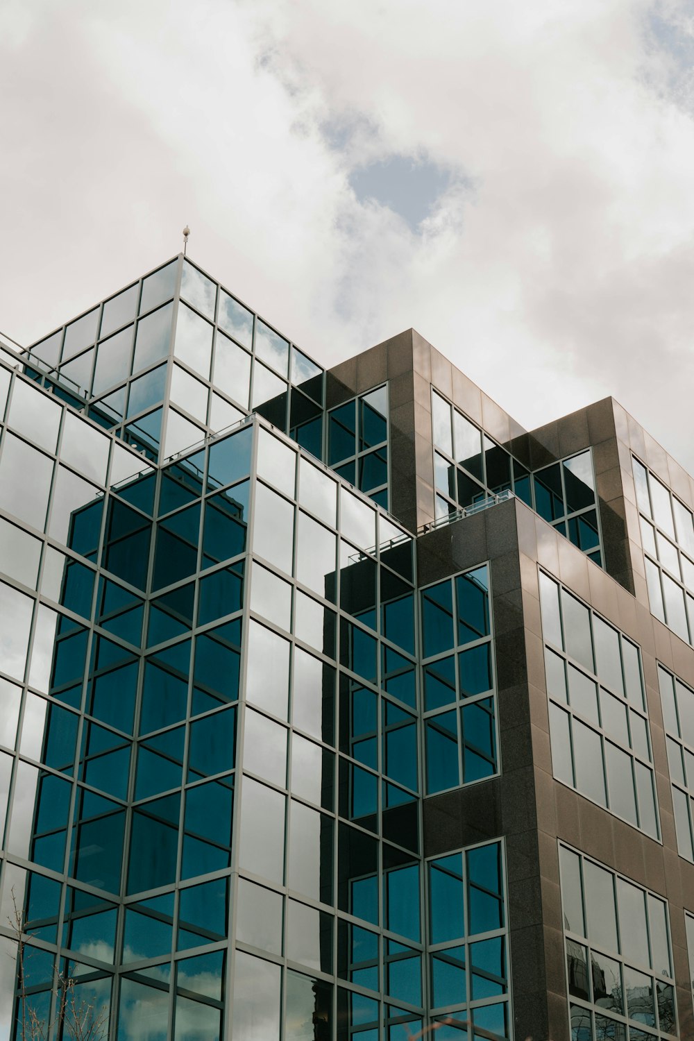 a tall building with lots of windows on top of it