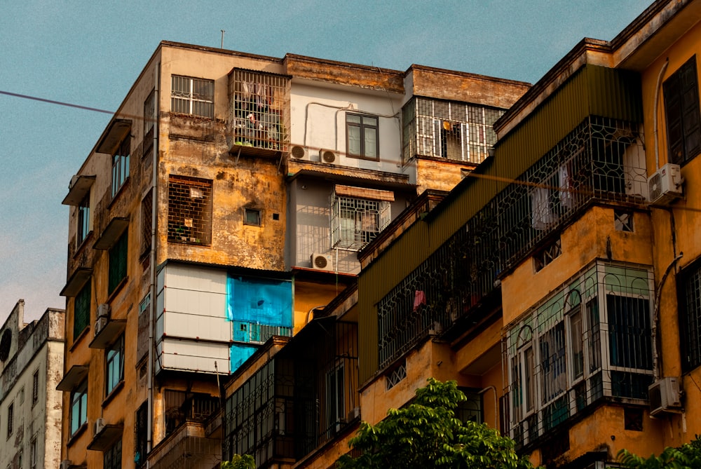 a group of buildings with balconies and balconies