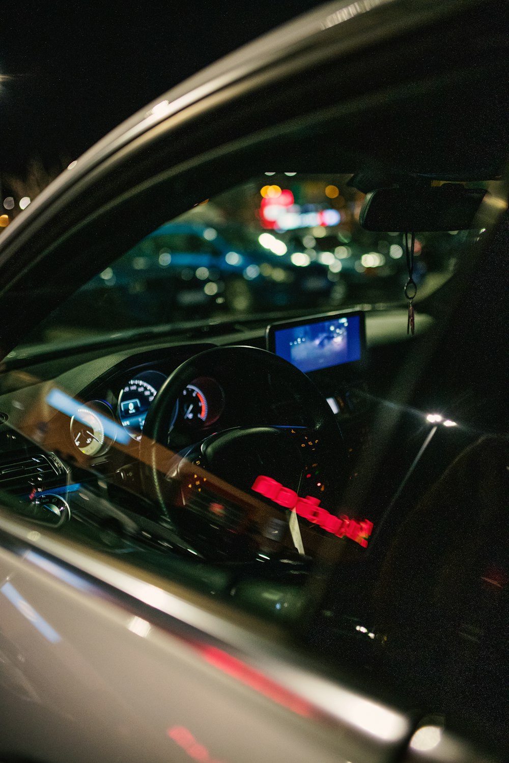 a view of a car's dashboard from inside the car