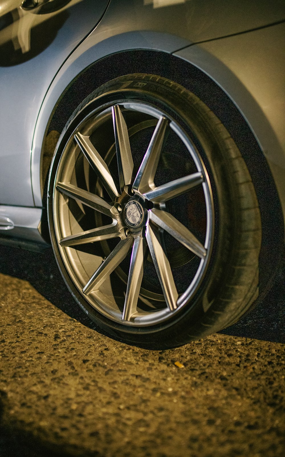 a close up of a wheel on a car