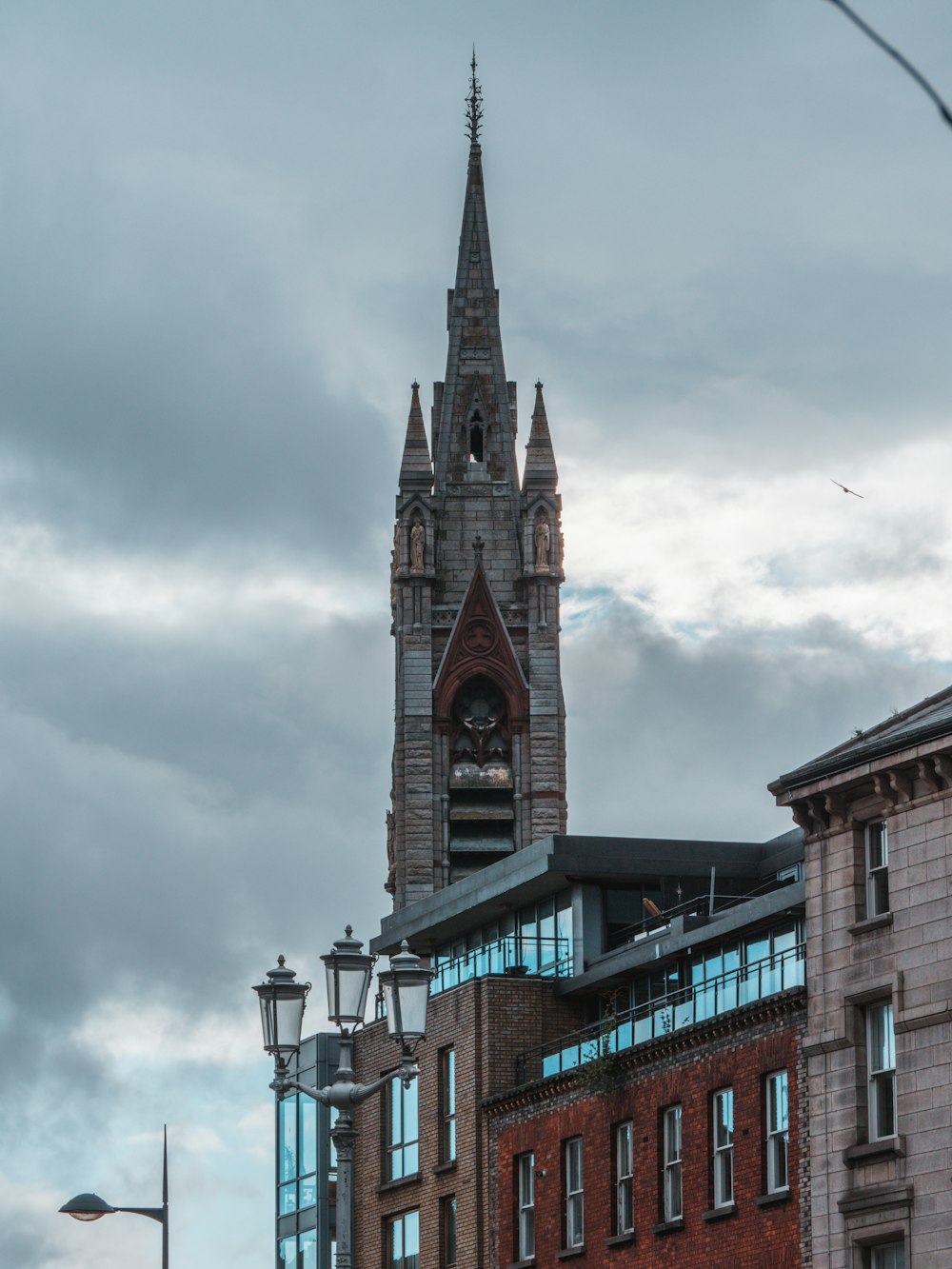 a tall clock tower towering over a city