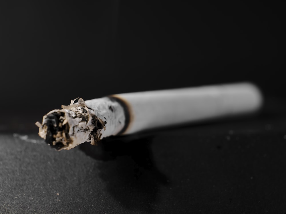 a close up of a cigarette on a table