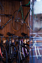 A colorful display of bike accessories arranged neatly on the shop wall.
