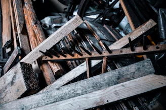 a pile of old wood and metal items
