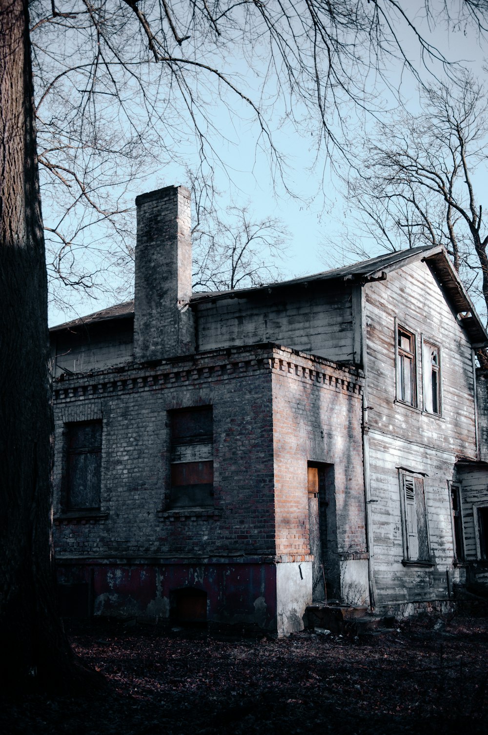 an old run down house in the woods