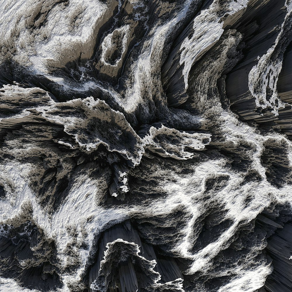 a black and white photo of a rock formation