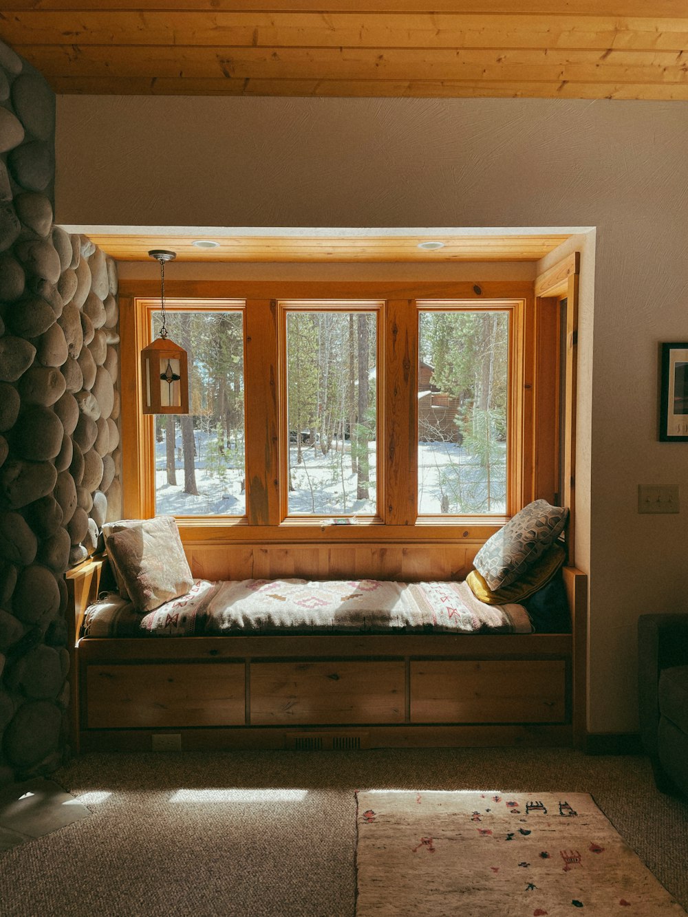 a living room with a couch and a window