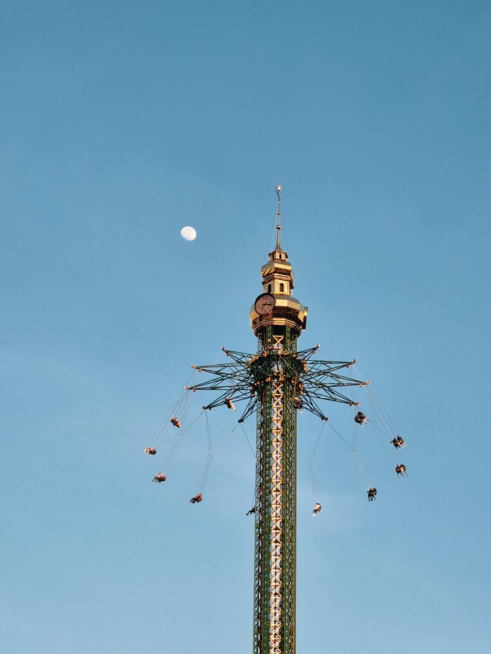 a tall tower with a clock on top of it