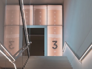 a staircase with a number on the side of it