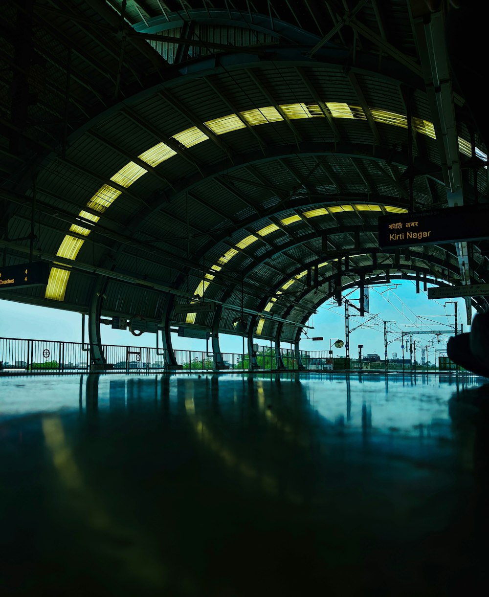 an empty swimming pool in a large building