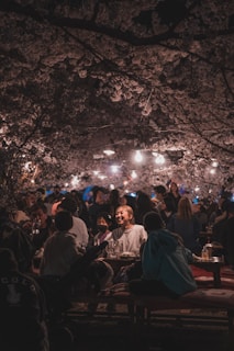 Smiling guests enjoying a lively outdoor event catered by Cherrywood Catering LLC.