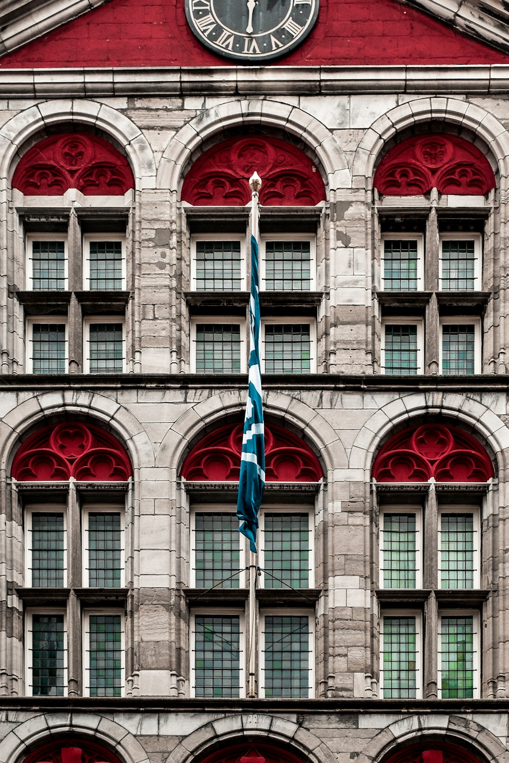 a large building with a clock on the top of it