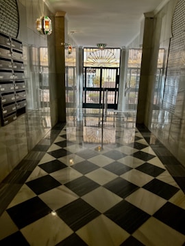 A sleek, modern mailroom with digital sorting screens and secure identity verification devices.