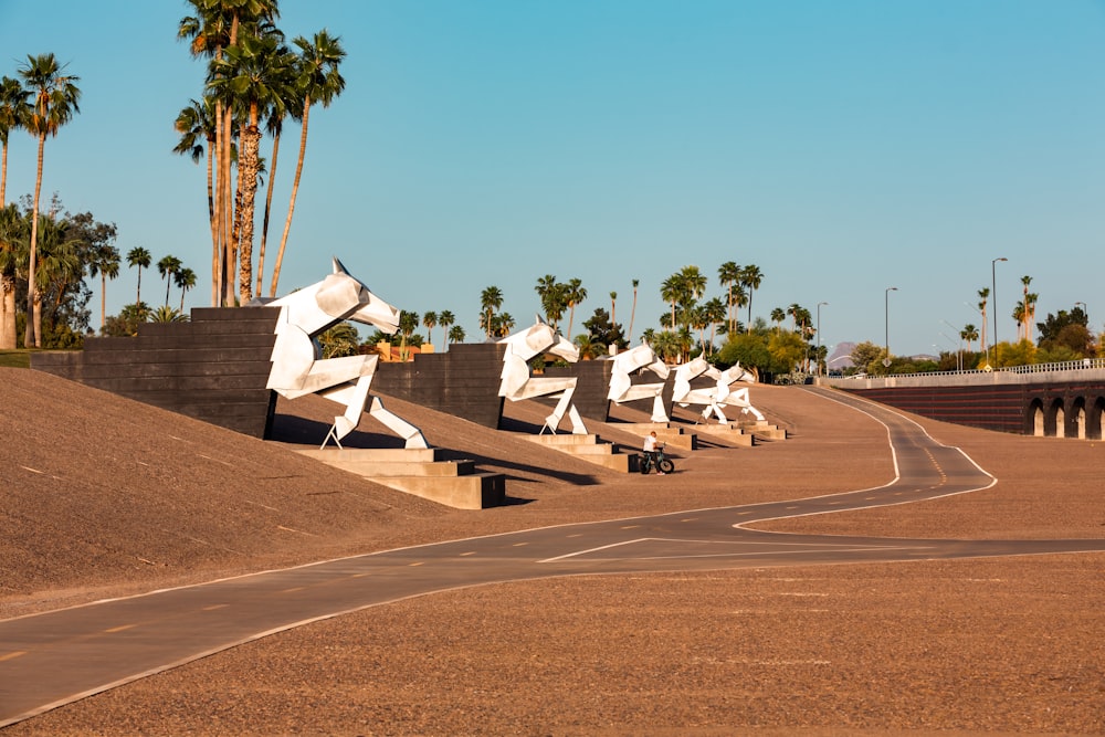 a skateboard park with skateboard ramps and sculptures