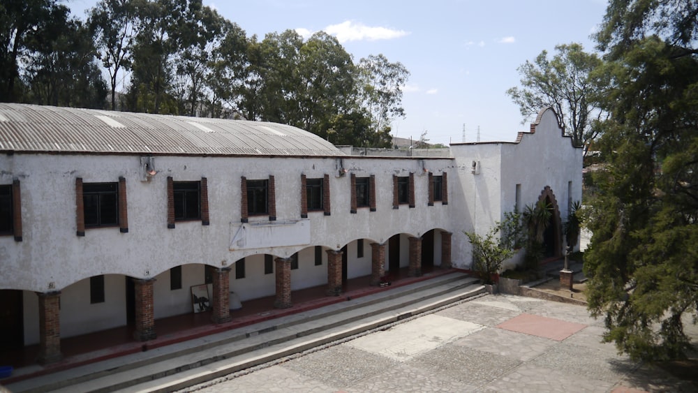 a large white building with lots of windows