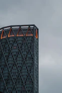 a very tall building with a sky in the background