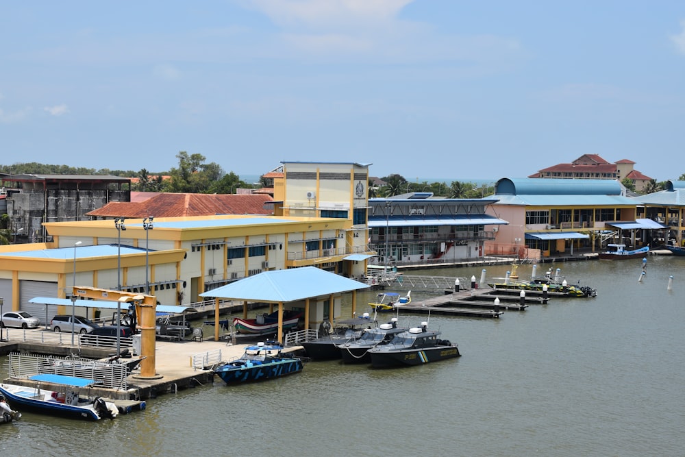 a group of boats that are sitting in the water