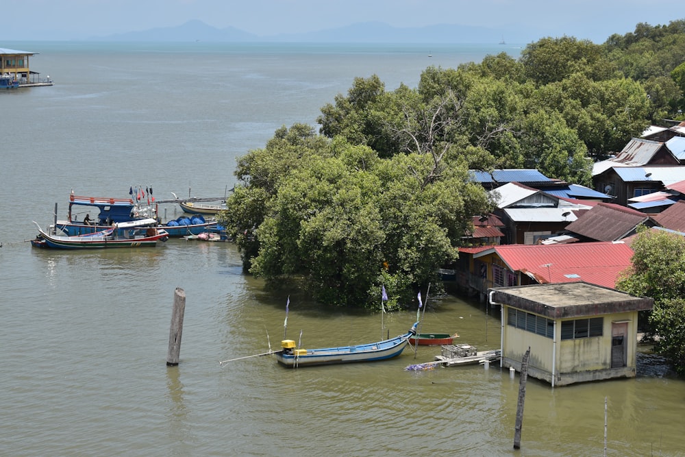 a group of boats that are sitting in the water