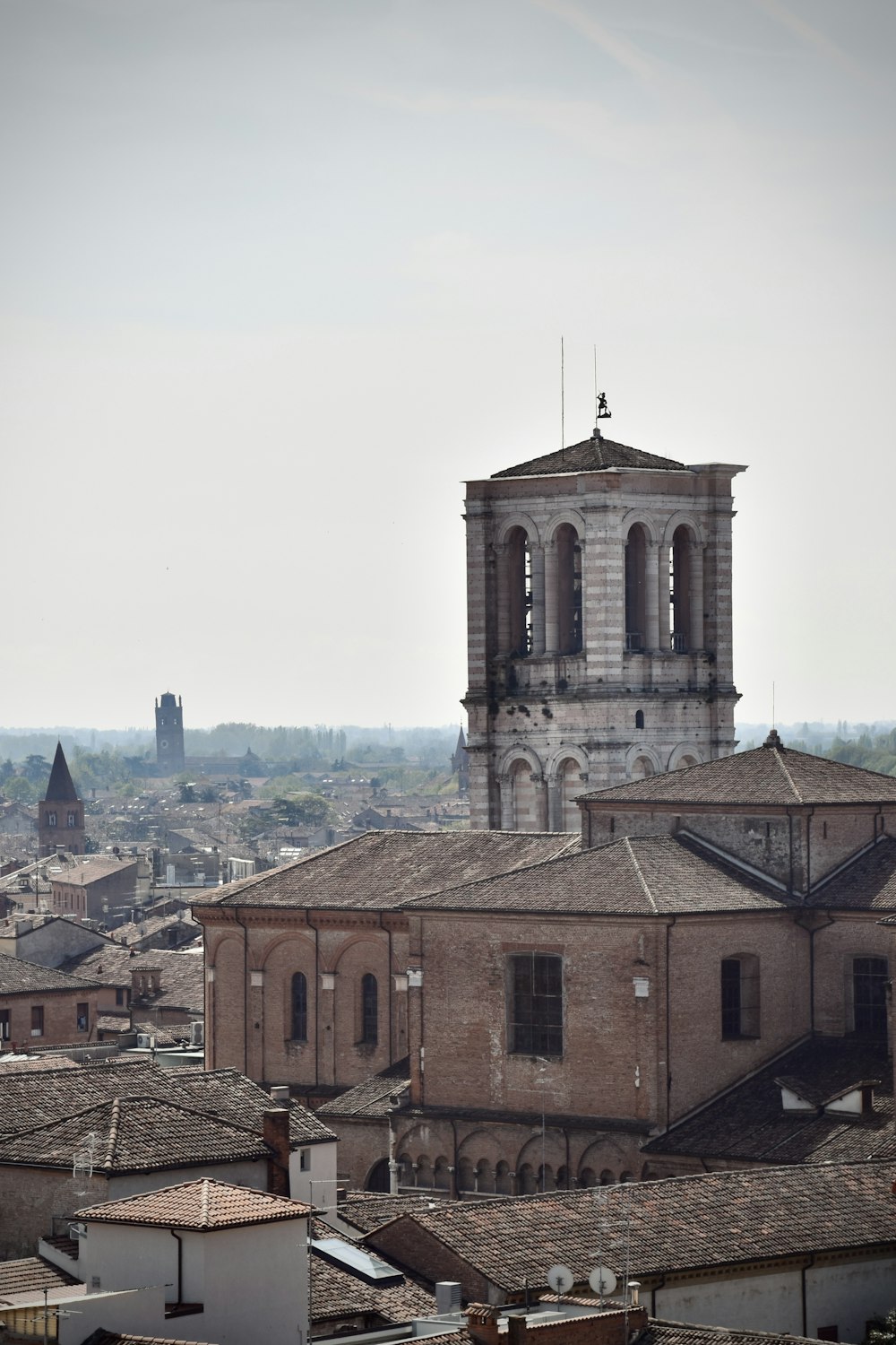 a view of a city with a clock tower