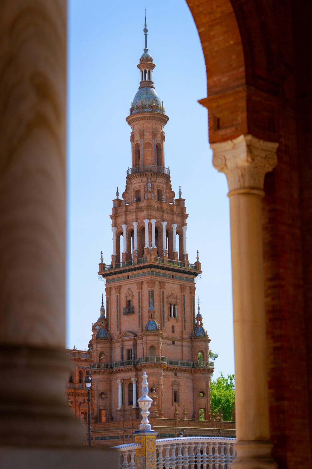 a tall tower with a clock on the top of it