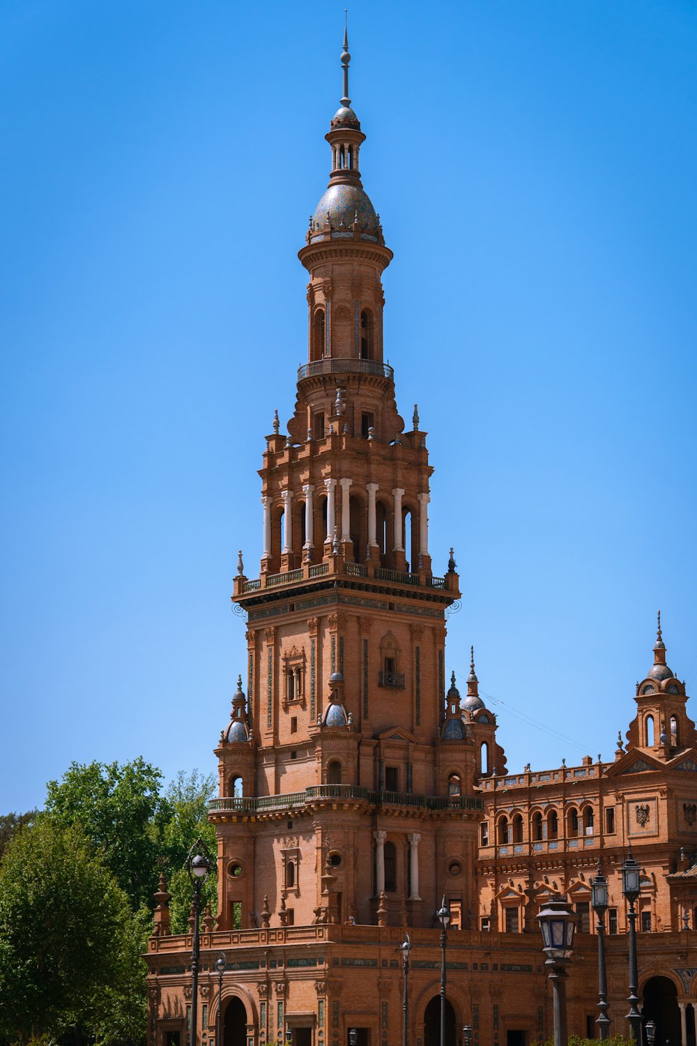 a tall building with a clock on the top of it