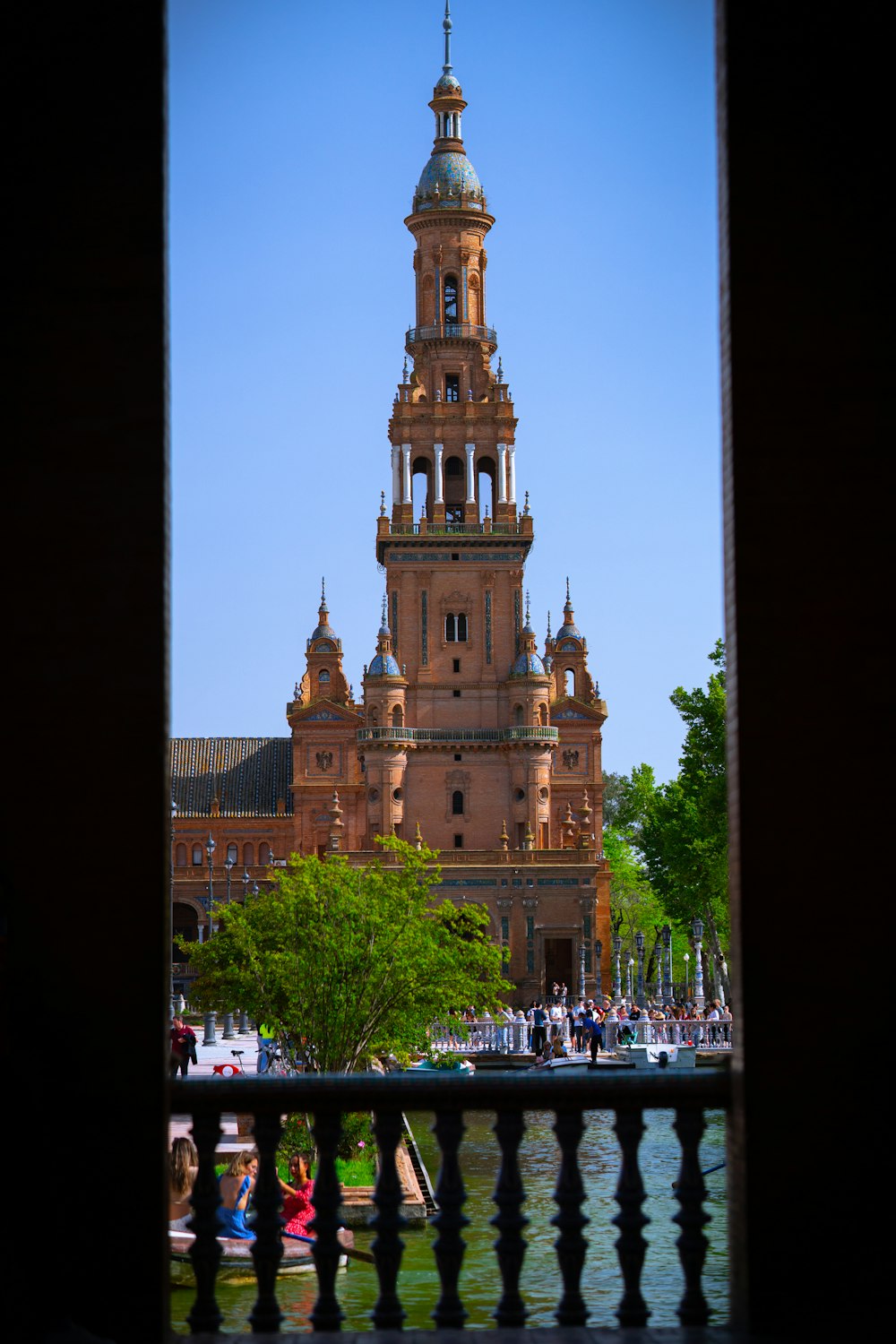 a tall tower with a clock on the top of it