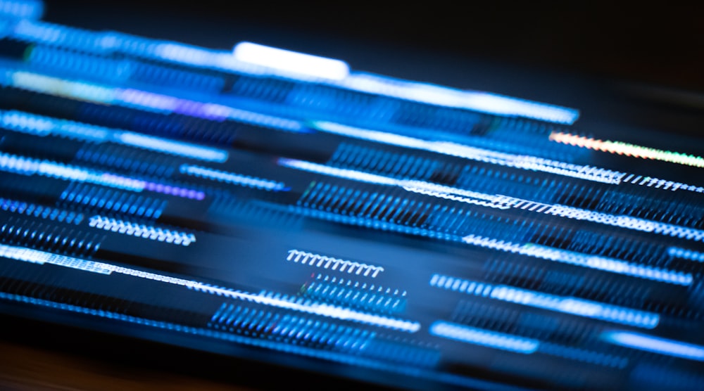 a close up of a computer keyboard with a blurry background