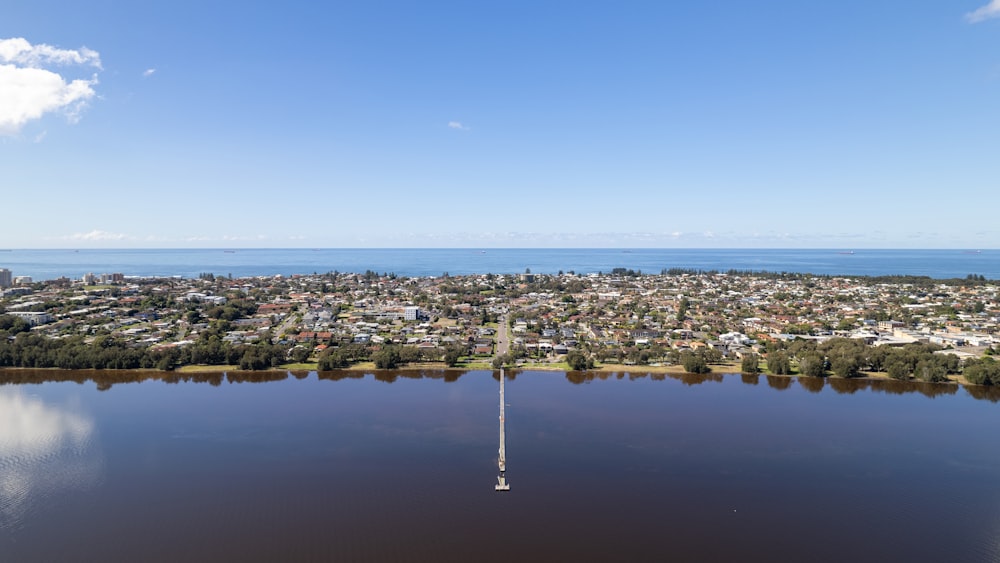 a large body of water surrounded by a city