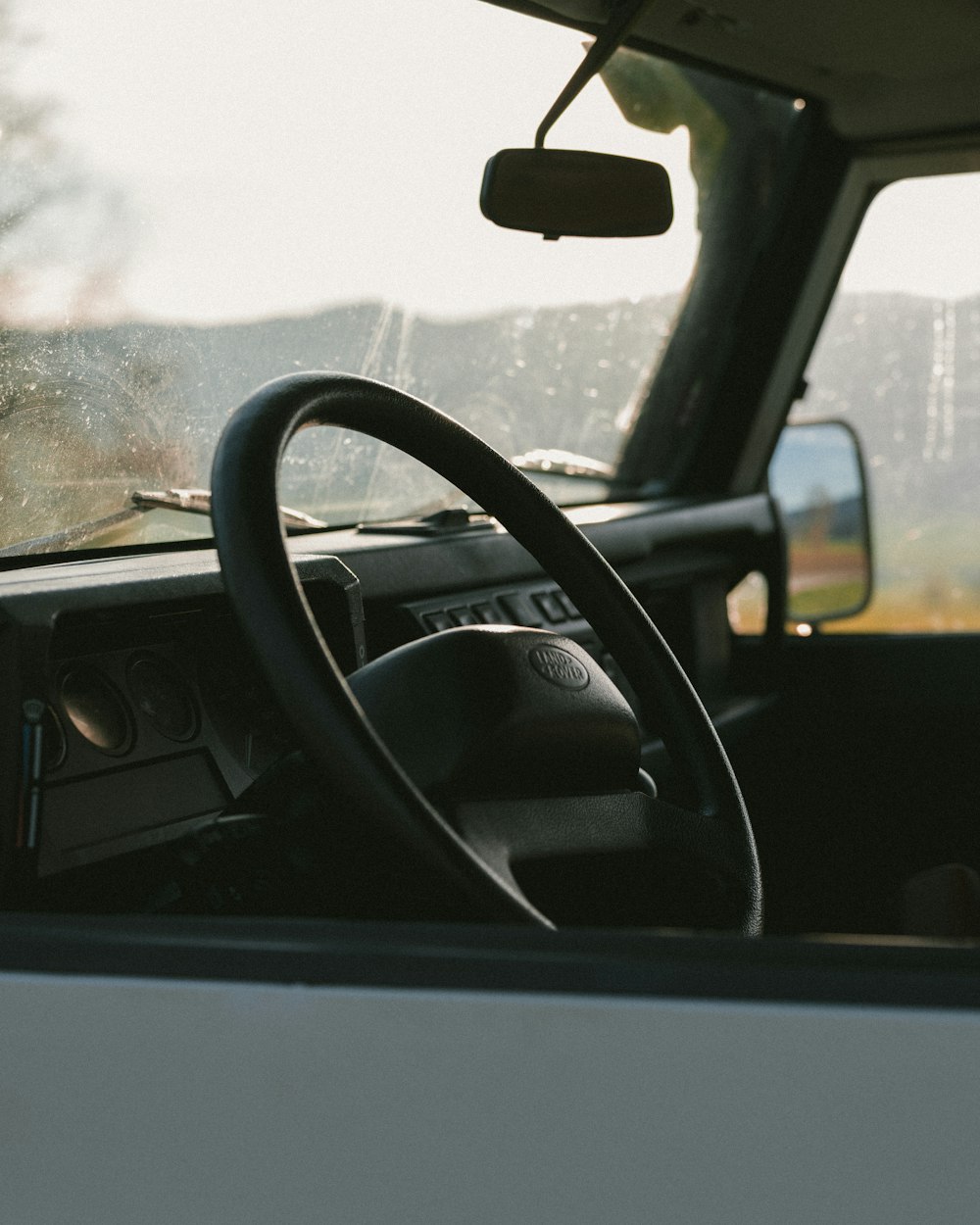 a truck with a steering wheel and a dashboard