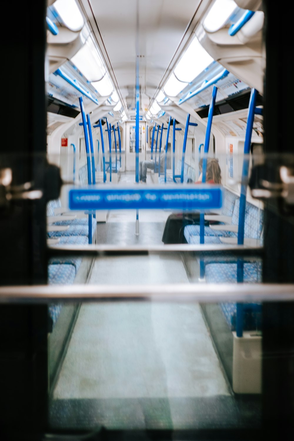 a view of the inside of a subway car