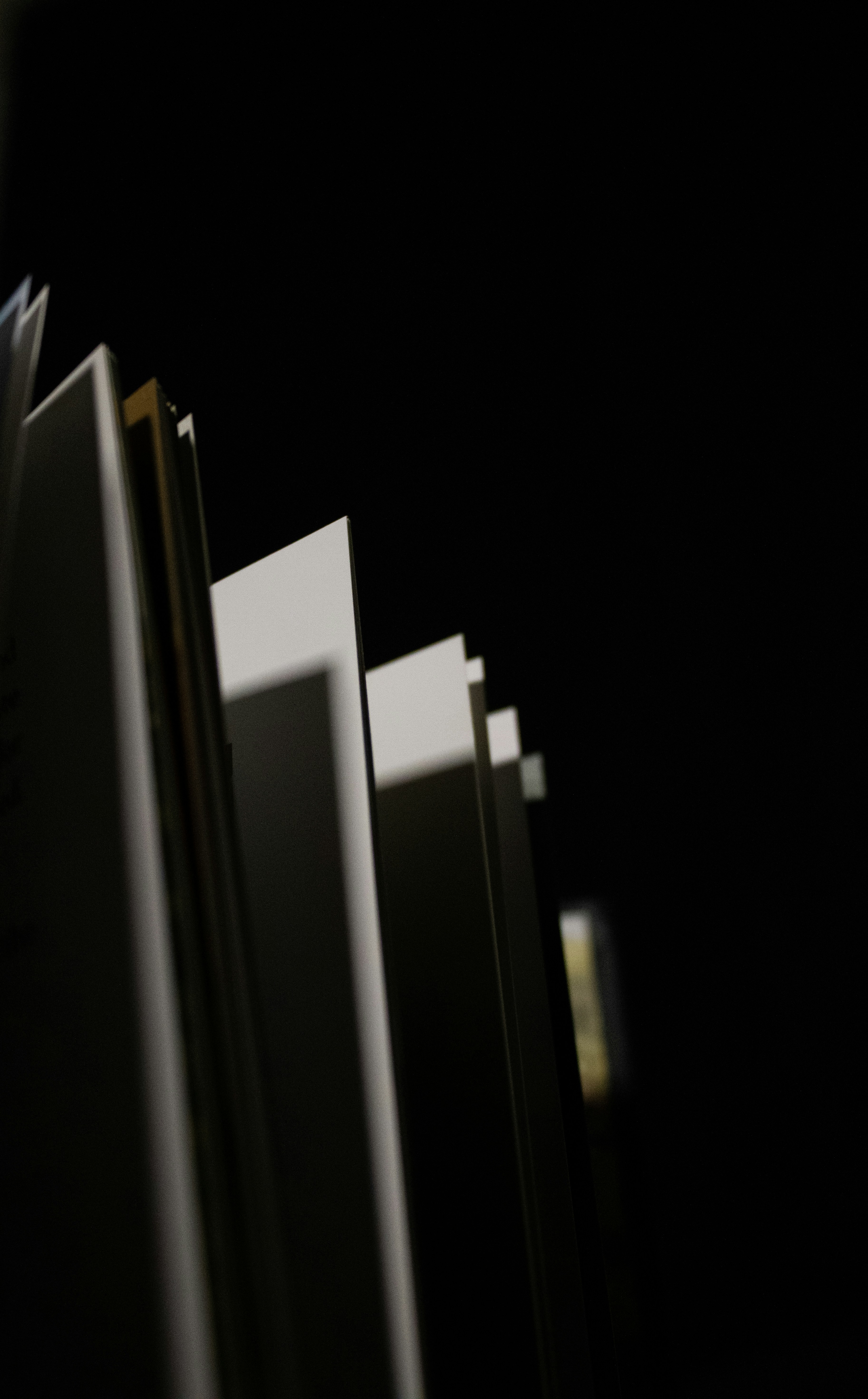 a row of books sitting on top of a table