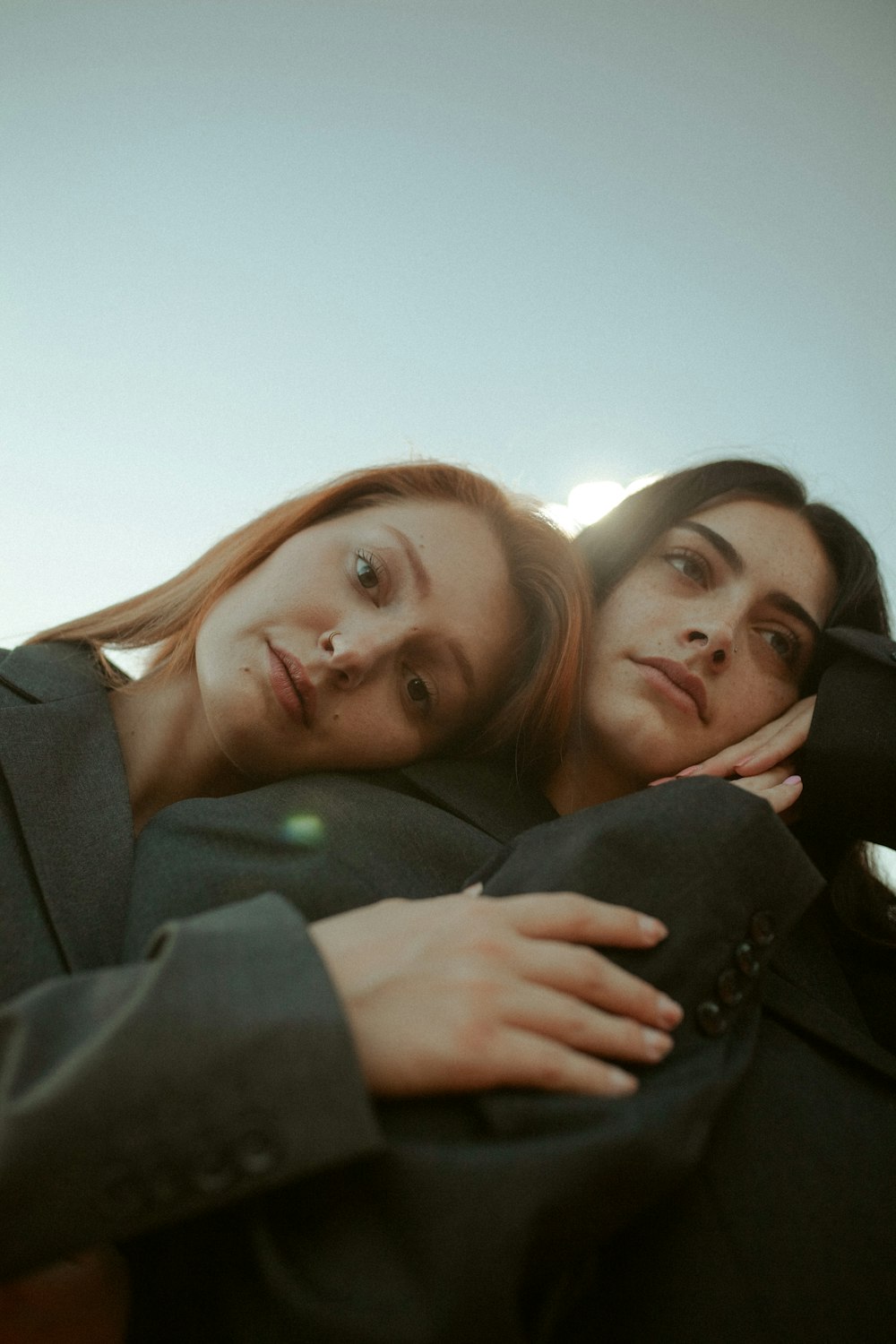 a couple of women standing next to each other