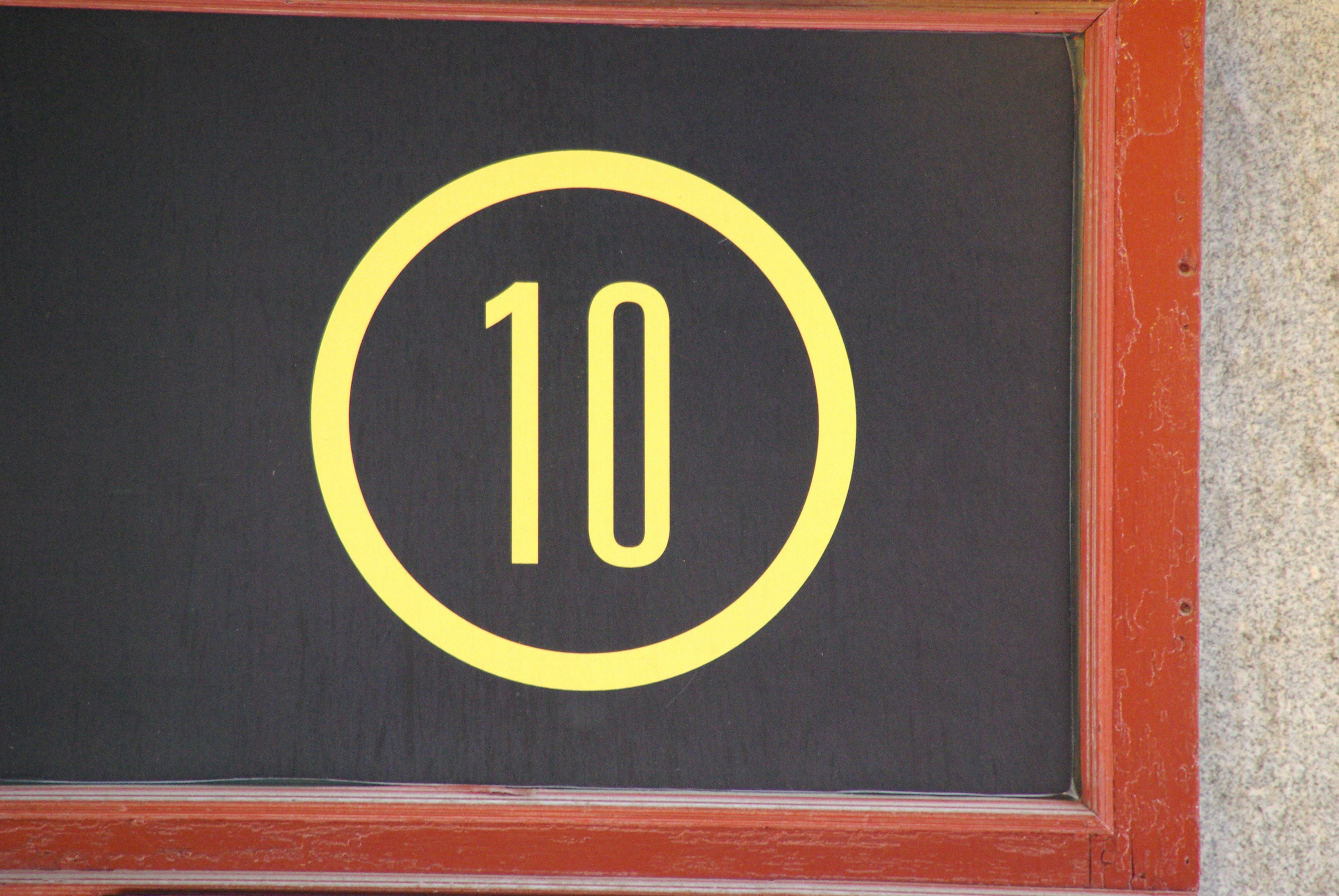 a close up of a sign on a building