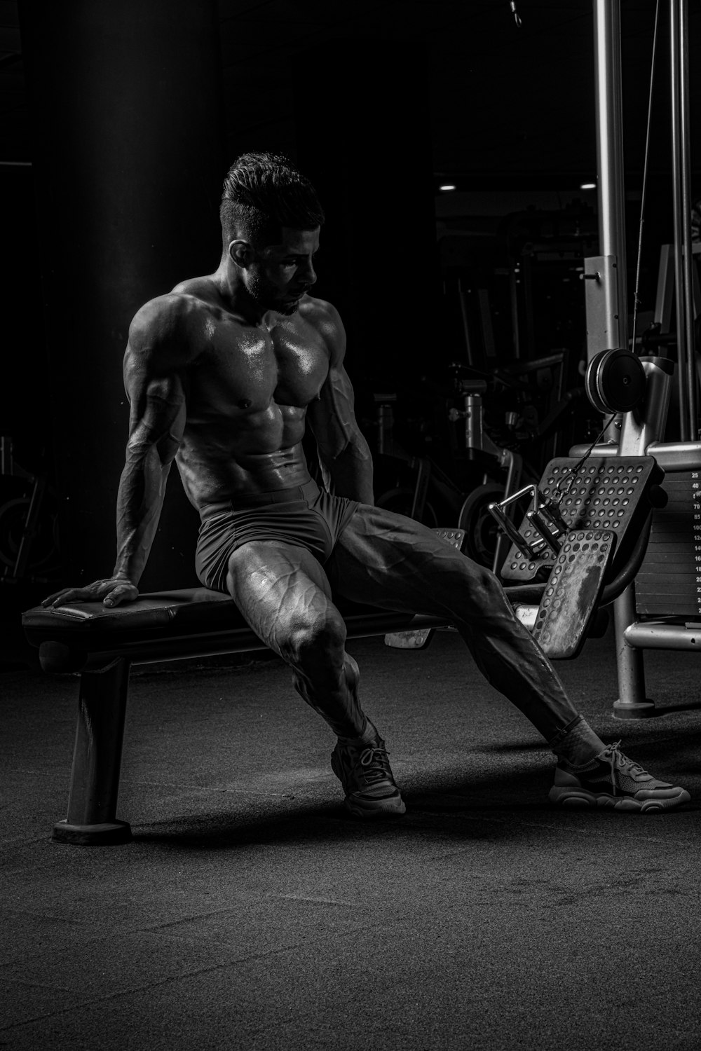 A a Image gym on – Free a Black sitting in man Unsplash photo bench on