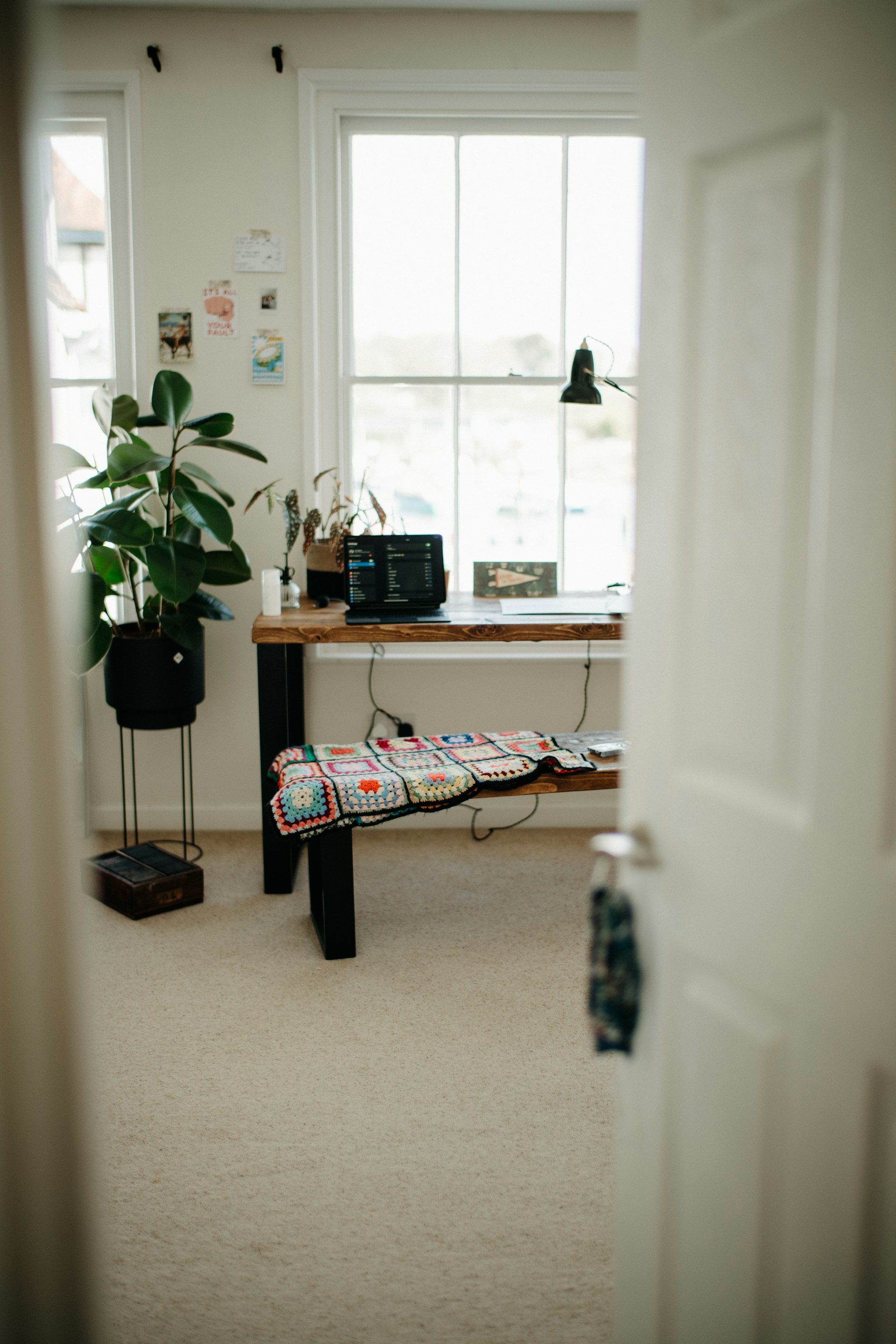 a room with a table and a bench in it