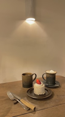 A cozy kitchen scene with a freshly baked cake on a wooden table and a handwritten note saying 'Let's chat!'