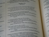 a close up of an open book with text