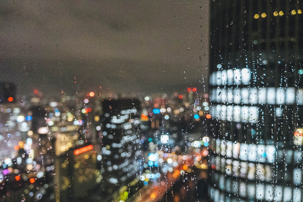 a view of a city at night from a window
