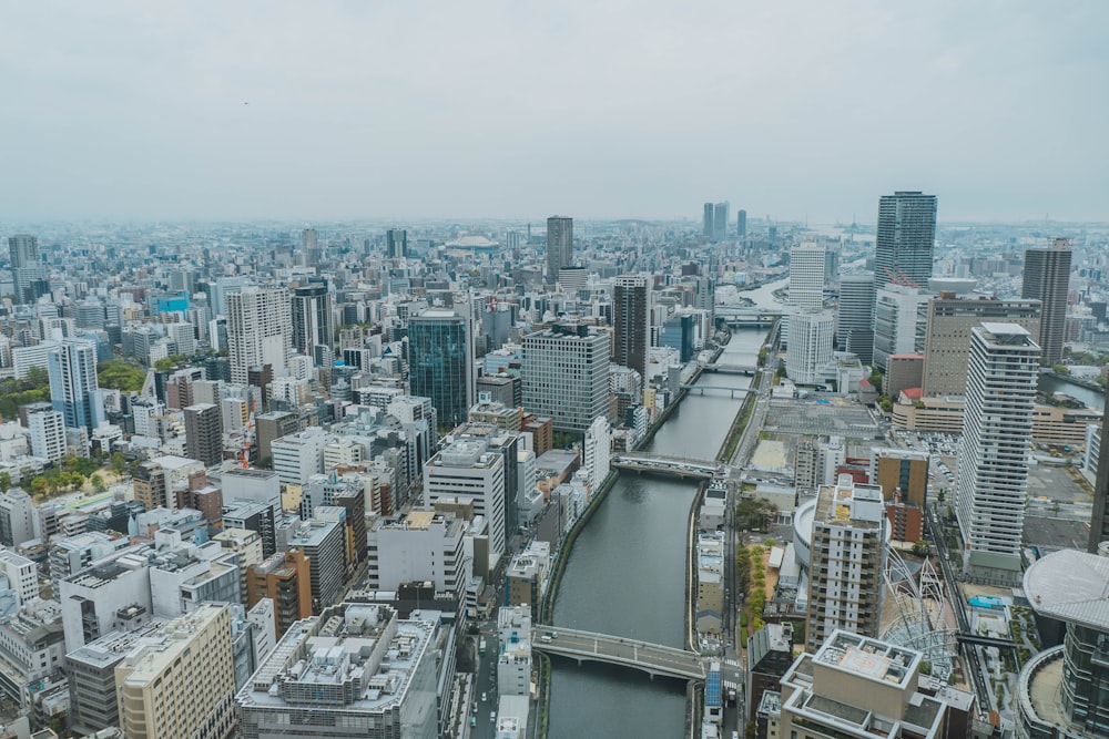 an aerial view of a city with a river running through it