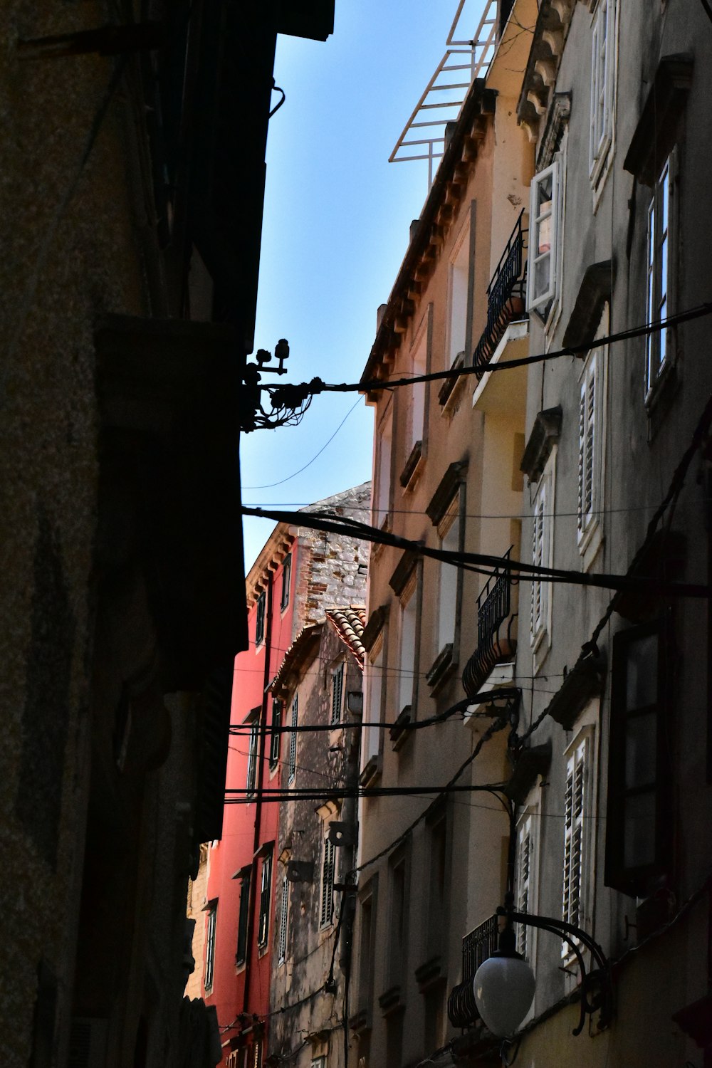 a row of buildings with a sky background